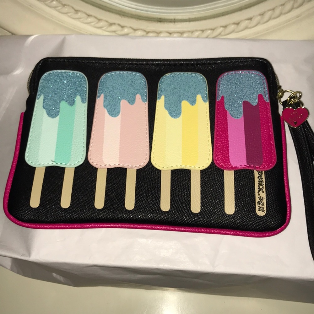 Betsey Johnson wristlet.